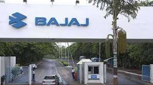 Bajaj Auto headquarters with earnings report overlay